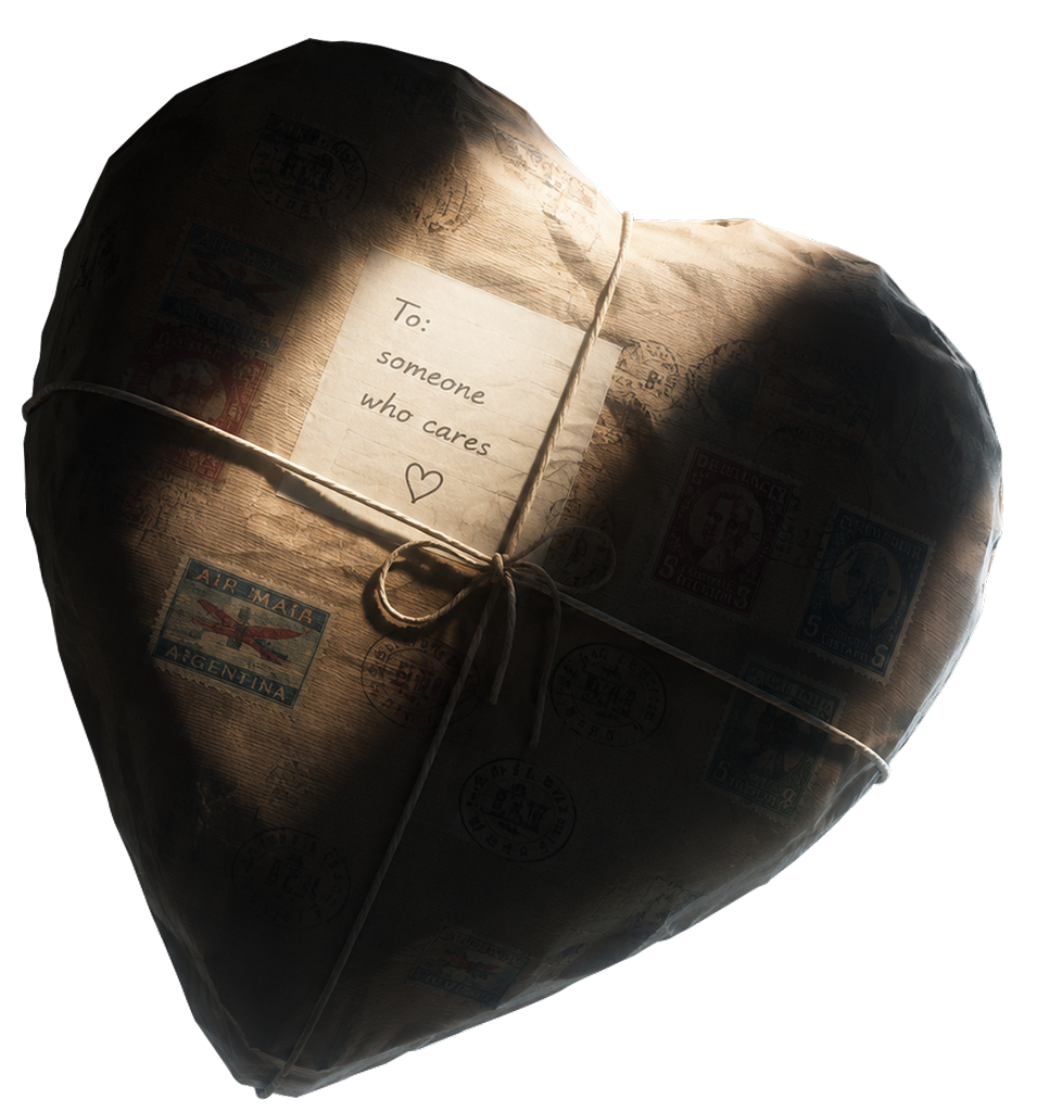 Heart-shaped package wrapped in kraft paper, labeled To: someone who cares